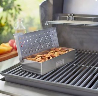 Guia para utilizar um defumador no seu barbecue a gás: dar um toque de fumo aos seus pratos